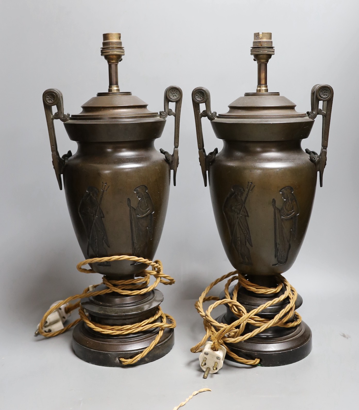 A pair of bronze Greek revival vase lamps. 43.5cm high